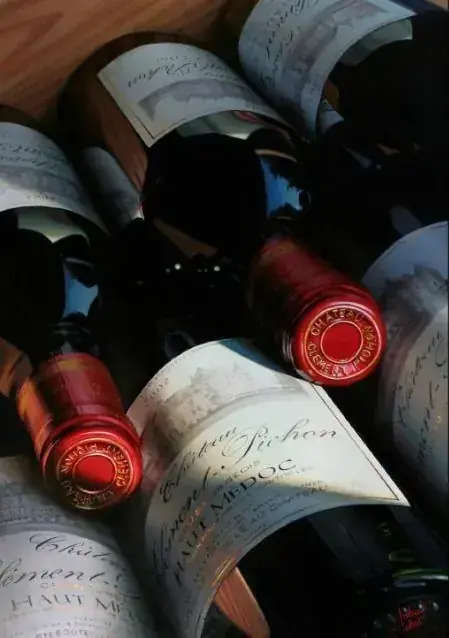 Bottles packed together in a wooden crate